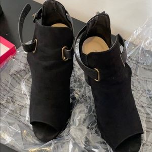 Peep toe bootie boots, black suede